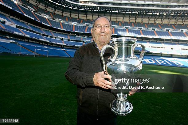 Real Madrid's legendary player Paco Gento poses with trophies during his interview with Real Madrid TV at Santiago Bernabeu's stadium on December 5,...