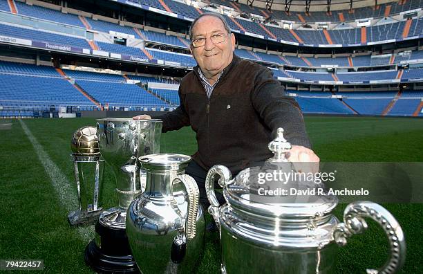 Real Madrid's legendary player Paco Gento poses with trophies during his interview with Real Madrid TV at Santiago Bernabeu's stadium on December 5,...