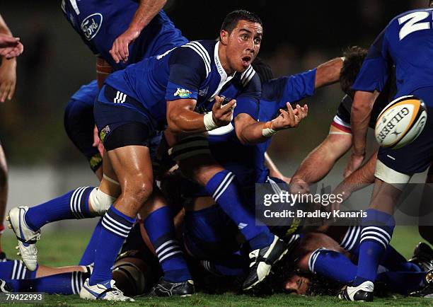 Kurtis Haiu of the Blues passes the ball during the Super 14 trial match between the Queensland Reds and the Auckland Blues at Ballymore on January...