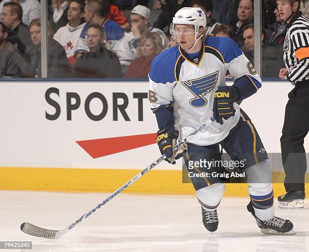 Erik Johnson of the St. Louis Blues skates up ice during game action against the Toronto Maple Leafs January 29, 2008 at the Air Canada Centre in...