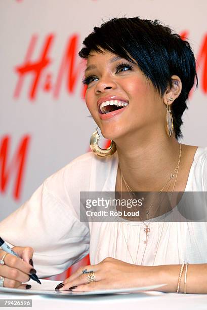 Singer Rihanna signs autographs at H&M for the launch of Fashion Against AIDS Collection on January 31, 2008 in New York City.