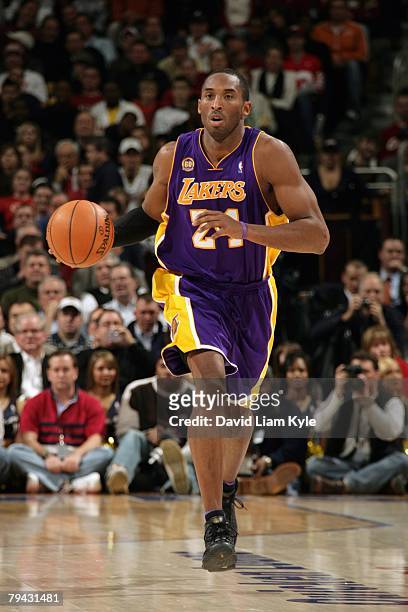 Kobe Bryant of the Los Angeles Lakers dribbles against the Cleveland Cavaliers during the game at The Quicken Loans Arena on December 20, 2007 in...