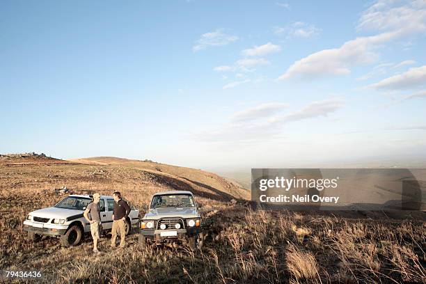 high angle view of 4x4's at featherstone kloof. grahamstown, eastern cape province, south africa - grahamstown stock pictures, royalty-free photos & images