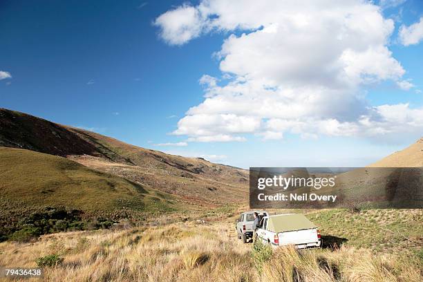 high angle view of 4x4's at featherstone kloof. grahamstown, eastern cape province, south africa - grahamstown stock pictures, royalty-free photos & images