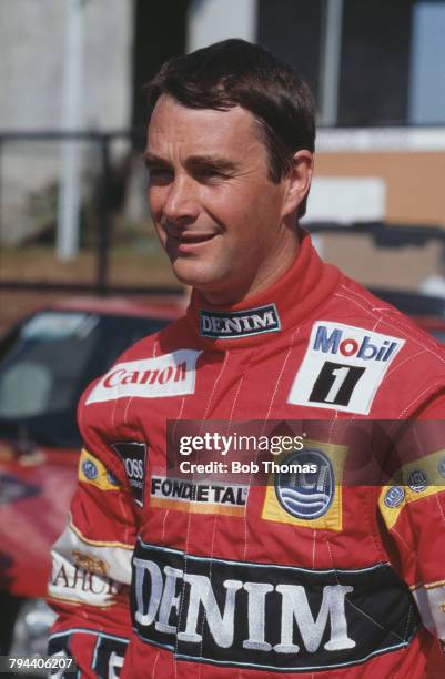 British racing driver Nigel Mansell, driver of the Canon Williams Williams FW12 Judd CV 3.5 V8, pictured during the 1988 Brazilian Grand Prix at the...