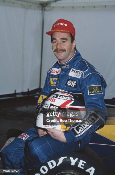 British racing driver Nigel Mansell, driver of the Canon Williams Renault Williams FW14 Renault RS3 3.5 V10 racing car, pictured at the Canon...