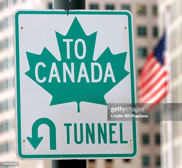 Sign directs drivers to the border crossing at the Detroit/Windsor Tunnel January 31, 2008 in Detroit, Michigan. Today is the first day that new...