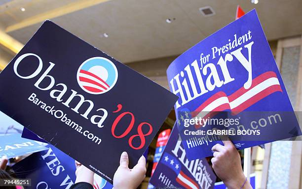 Supporters of Democratic presidential hopefuls Illinois Senator Barack Obama New York Senator Hillary Clinton wait outside the Kodak Theatre before...