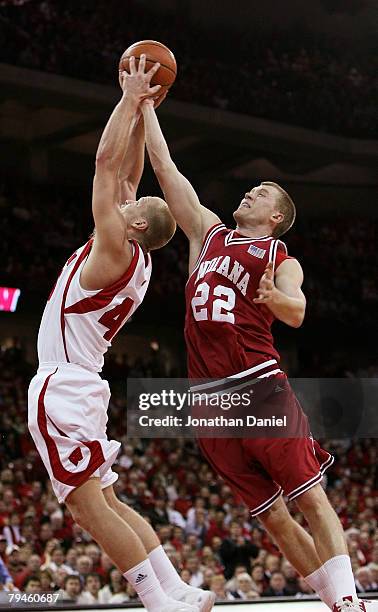 Joe Krabbenhoft of the Wisconsin Badgers and Lance Stemler of the Indiana Hoosiers battle for a rebound at the Kohl Center January 31, 2008 in...