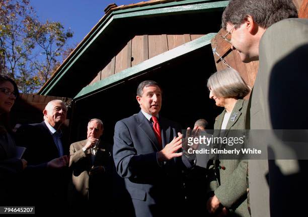 Mark Hurd , Chief Executive Officer of Hewlett-Packard Company, chats with people on the opening day of the HP Garage Museum. Hurd and others stand...