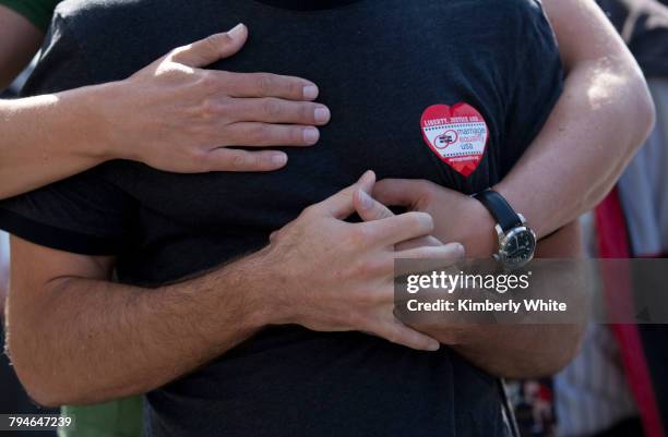 Two men hug in front of a Supreme Court building in San Francisco, California. California's supreme court has backed a ban on gay marriage, ruling...