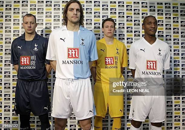 Scottish footballer Alan Hutton, English footballer Jonathan Woodgate, Welsh footballer Chris Gunter and Brazil's Gilberto pose for photographers as...