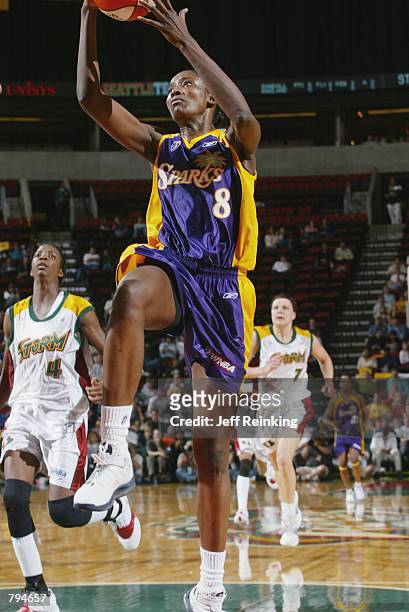 DeLisha Milton of the Los Angeles Sparks goes up for a shot during the game against the Seattle Storm on June 18, 2002 at Key Arena in Seattle,...