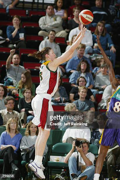 Lauren Jackson of the Seattle Storm shoots over DeLisha Milton of the Los Angeles Sparks during the game on June 18, 2002 at Key Arena in Seattle,...