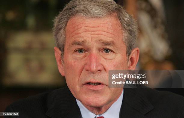 President George W. Bush speaks prior to signing a Presidential Proclamation in honor of American Heart Month at the InterContinental Hotel in Kansas...