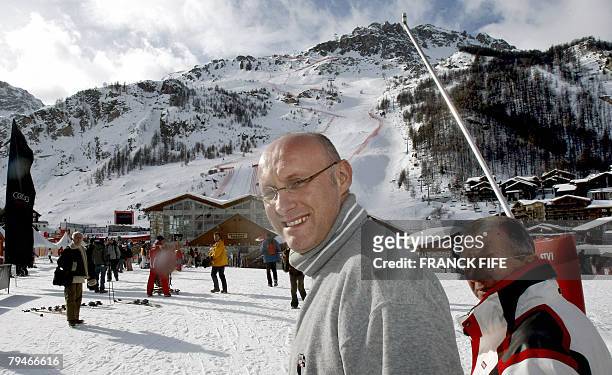 French sports minister Bernard Laporte walks in front of the Olympic slope "Bellvarde", 01 February 2008 in Val-D'Isere, after a press conference on...