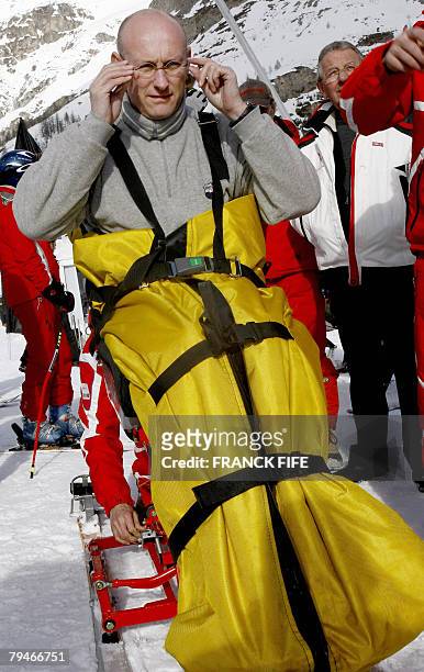 French sports minister Bernard Laporte in a ski-cart makes his way on the slope 01 February 2008 in Val-d'Isere, southeastern France. Laporte will...