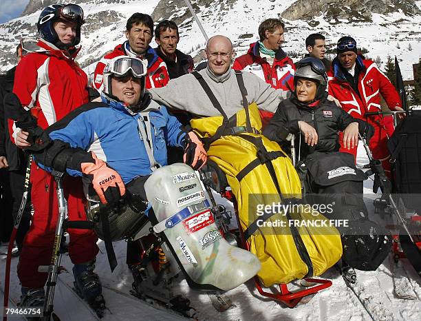 French sports minister Bernard Laporte , French handicapped skier Yohann Taberlet and Olympic champion Delphine Le Sausse pose 01 February 2008 in...