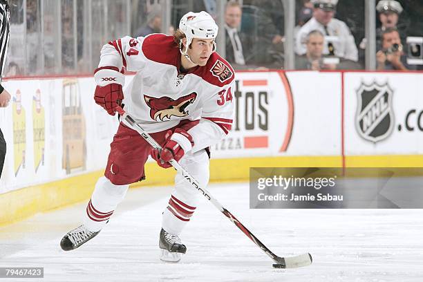 Daniel Winnik of the Phoenix Coyotes skates with the puck against the Columbus Blue Jackets on January 29, 2008 at Nationwide Arena in Columbus, Ohio.