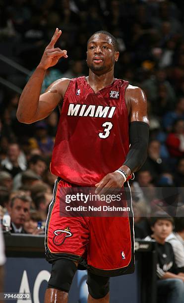 Dwyane Wade of the Miami Heat signals a play during their game against the Washington Wizards at the Verizon Center on December 29, 2007 in...