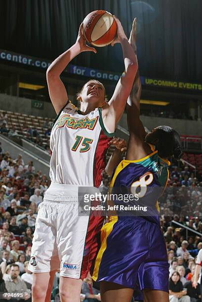 Lauren Jackson of the Seattle Storm shoots over DeLisha Milton of the Los Angeles Sparks during the game on June 18, 2002 at Key Arena in Seattle,...
