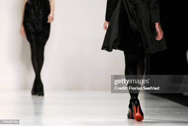 Model walks down the catwalk at the Sinemus fashion show during the Mercedes Benz Fashion Week Berlin autumn/winter 2008 on January 29, 2008 in...