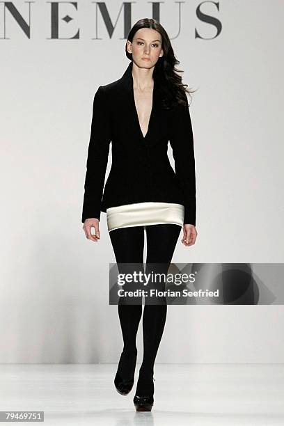 Model walks down the catwalk at the Sinemus fashion show during the Mercedes Benz Fashion Week Berlin autumn/winter 2008 on January 29, 2008 in...