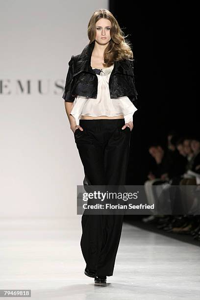 Model walks down the catwalk at the Sinemus fashion show during the Mercedes Benz Fashion Week Berlin autumn/winter 2008 on January 29, 2008 in...