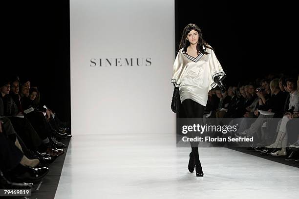 Model walks down the catwalk at the Sinemus fashion show during the Mercedes Benz Fashion Week Berlin autumn/winter 2008 on January 29, 2008 in...