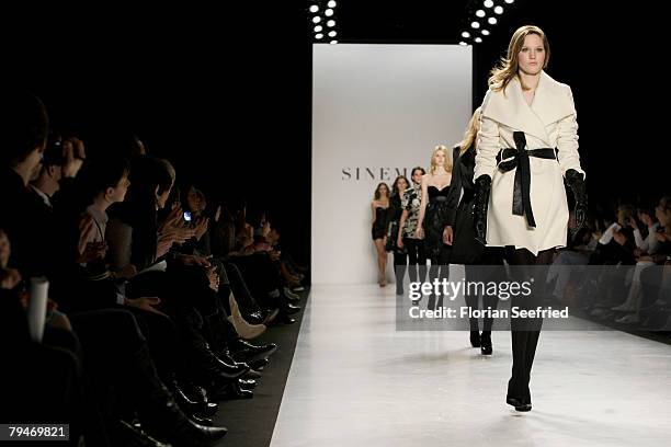 Model walks down the catwalk at the Sinemus fashion show during the Mercedes Benz Fashion Week Berlin autumn/winter 2008 on January 29, 2008 in...