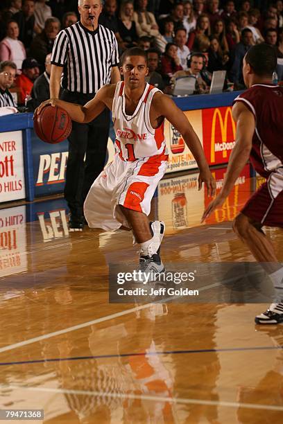 Tyler Tucker of the Pepperdine Waves dribbles the ball against the Loyola Marymount Lions on January 26, 2008 in Malibu, California.