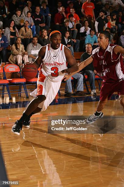 Tyrone Shelley of the Pepperdine Waves dribble drives against the Loyola Marymount Lions on January 26, 2008 in Malibu, California.