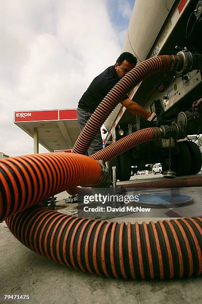 Marcos Moran delivers gasoline to an Exxon gas station on February 1, 2008 in Burbank, California. Exxon Mobil Corp. Has posted an annual profit of...