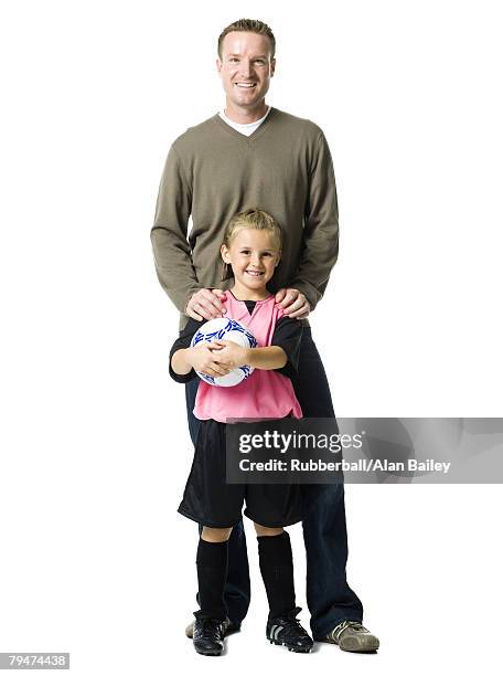 father and daughter with soccer ball - alan ball fútbol fotografías e imágenes de stock