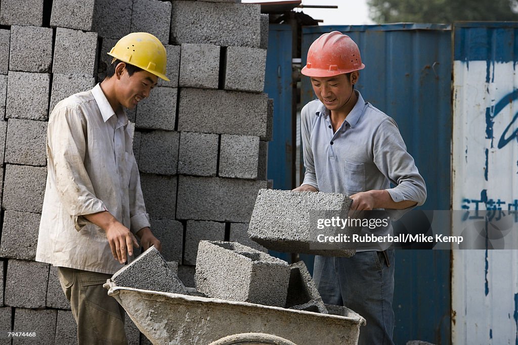 Two construction workers on the job site