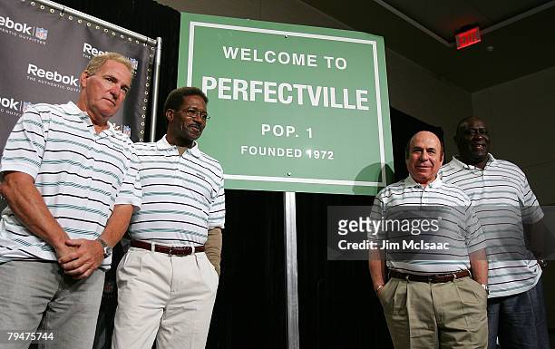 Former Miami Dolphins Jim Kiick, Eugene "Mercury" Morris, Garo Yepremian, and Larry Little answer questions attend a press conference anouncing...