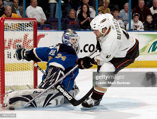 Manny Legace of the St. Louis Blues stops a shot from Todd Bertuzzi of the Anaheim Ducks during a shootout to seal the victory at Scottrade Center...