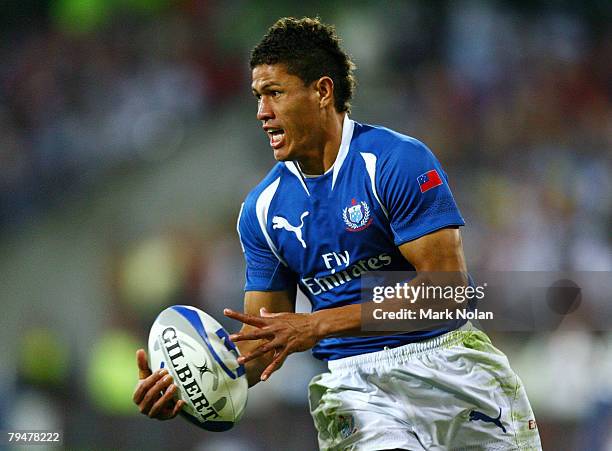 Mikaele Pesamino of Samoa looks to offload during the Cup Final between Samoa and New Zealand in the New Zealand International Sevens at Westpac...