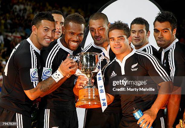 New Zealand holds the trophy after winning the final against Samoa during the New Zealand International Sevens at Westpac Stadium on February 2, 2008...