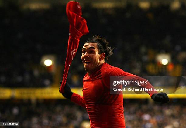 Carlos Tevez of United celebrates the equalising goal of Tottenham during the Barclays Premier League match between Tottenham Hotspur and Manchester...