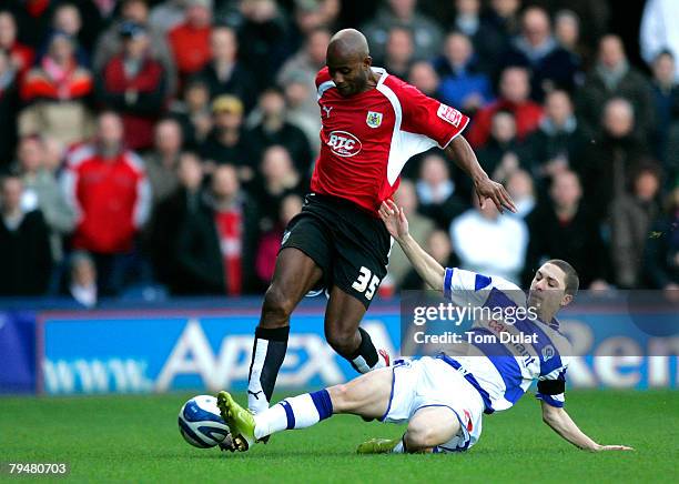 Hogan Ephraim of Queens Park Rangers tackles new signing of Bristol City Dele Adebola during the Queens Park Rangers v Bristol City match at Loftus...