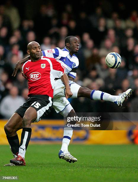 Damion Stewart of Queens Park Rangers and Dele Adebola of Bristol City in action during the Coca-Cola Championship match between Queens Park Rangers...