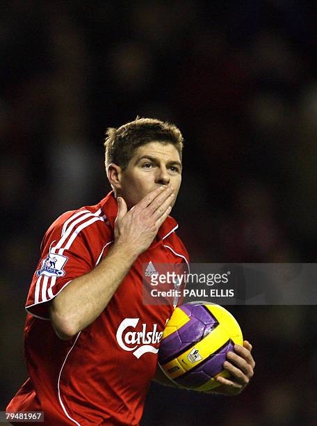Liverpool's English midfielder Steven Gerrard celebrates scoring a penalty against Sunderland during their English Premiership football match at...
