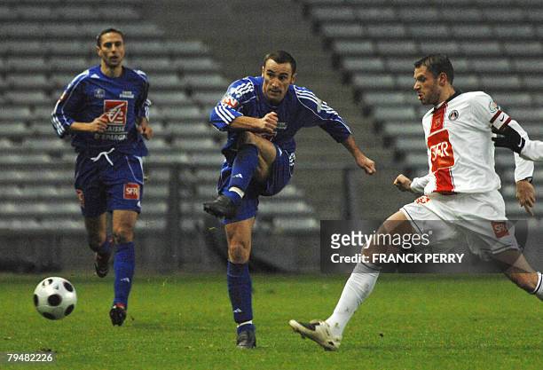 S defender Sylvain Armand vies with Le Poire-sur-Vie' s forward Anthony Guilleux , during their French Cup football match, 02 February 2008 in...