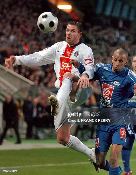 Paris' defender Sylvain Armand vies with Le Poire-sur-Vie's forward Djilalli Bekkar , during their French Cup football match, 02 February 2008 in...