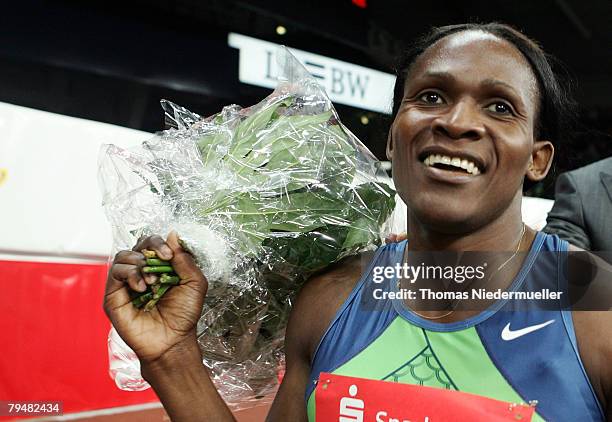 Maria de Lurdes Mutola of Mozambique celebrates her victory after the 800m run during the Sparkassen Cup 2008 at the Hanns-Martin Schleyer Hall on...