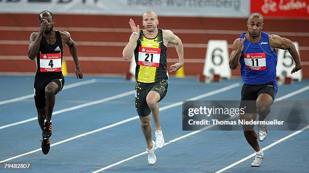 Kim Collins of St. Kits, Tobias Unger of Germany and Marius Broening of Germany in actionat the 60 meters competition during the Sparkassen Cup 2008...