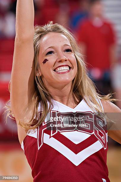 Arkansas Razorback cheerleader performs during a game against the Florida Gators at Bud Walton Arena on February 2, 2008 in Fayetteville, Arkansas....