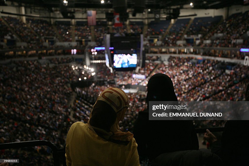 Two Moslem women watches US Democratic p