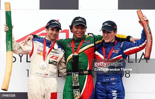 Neel Jani of Switzerland, Adrian Zaugg of South Africa and Robbie Kerr of Great Britain celebrate on the podium after the Australian A1 Grand Prix at...